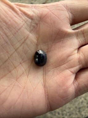 Small Dark Blue Oval Gemstone